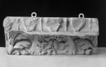 Fragment of the enriched abacus of a Corinthian or Composite capital