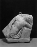 Fragment of a Roman sarcophagus lid depicting a slain niobid. 