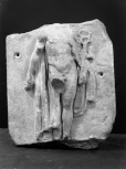 Fragmentary section of a relief panel(?): facing figure of Hermes 