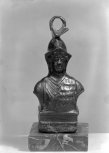 A sliding counter-weight in the form of a bust of Minerva, from a steelyard or<i> statera</i> balance, also known as  a Roman balance.