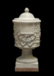 Cinerary vase decorated with candelabra and garlands