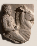 Cast of a Greek fragment of a mounted rider on a horse