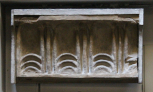 Cast of a fragment of enriched corona moulding