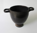 An Apulian (Greek) gnathia-style <i>skyphos</i> (two-handled deep wine cup) 