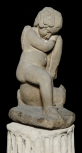 Statue of a sleeping cupid: a figure for a Roman fountain