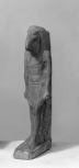 Statuette of the ibis-headed God Thoth, wearing a wig with lappets over the shoulders and a pleated loin cloth and standing with his left foot advanced, arms by his sides. 