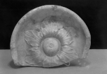 Fragment of Roman frieze(?) enrichment: a patera with a floral centre 