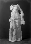 Small statue: a nymph or related figure, probably from a garden fountain