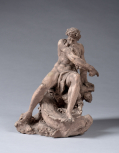A small figure of Neptune riding on a dolphin