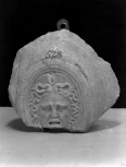 Fragment of an oval shield with a medusa head 