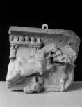 Fragment of the right-hand end of the front of a child's sarcophagus depicting a chariot race of cupids in the circus