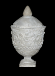 A Roman funerary (cinerary) vase decorated with pairs of griffins flanking symbolic ornaments resembling flaming candelabra 