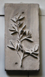 Cast of an antique relief of an olive branch 