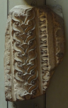 Fragment of the enriched soffit of an architrave